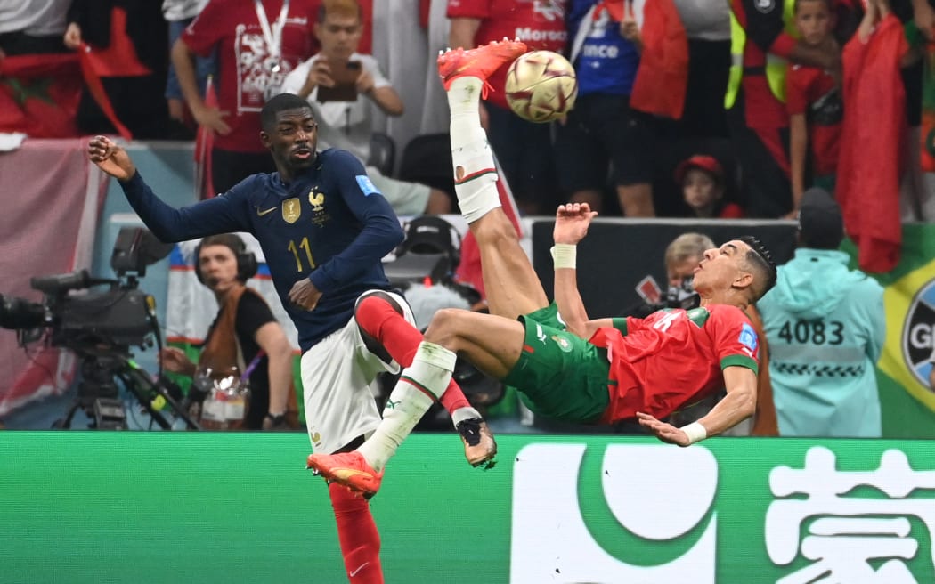 Morocco’s Jawad El Yamiq shoots a bicycle kick goalward during the FIFA World Cup semi-final match at Al Bayt Stadium in Al Khor, Qatar on 14 December, 2022.