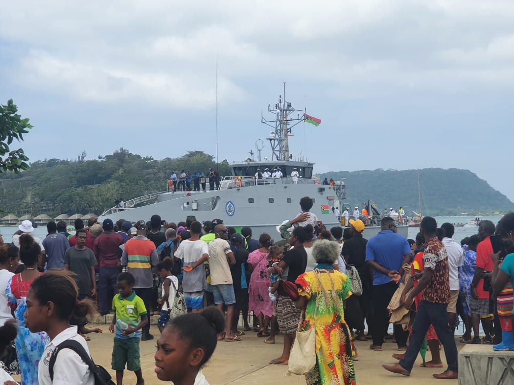 People line the Port Vila Sea Wall for the formal welcome of Vanuatu's new patrol boat RVS Takuare.