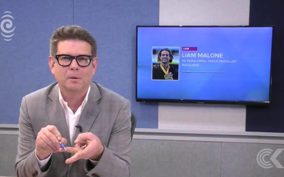 Liam Malone arrives home with Paralympics team