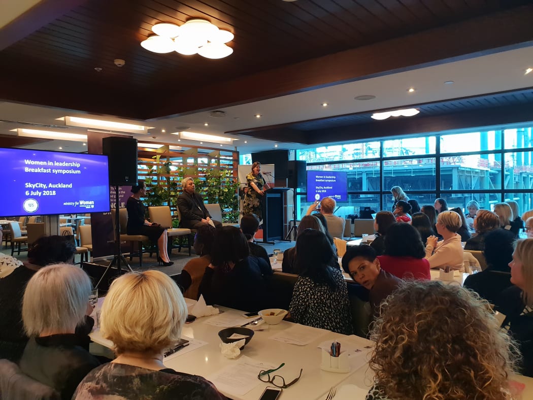 Audience and speakers at a Women in Leadership symposium, Auckland