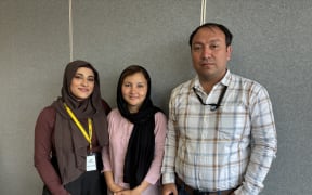 Aqela Barati and her husband, Mohammad Kazim and their translator Marwa