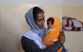 World Vision Afghanistan National Director, Asuntha Charles, visits World Vision's Health & Nutrition programme in Herat province, where children are suffering from hunger because of drought, which is already in its fifth year.