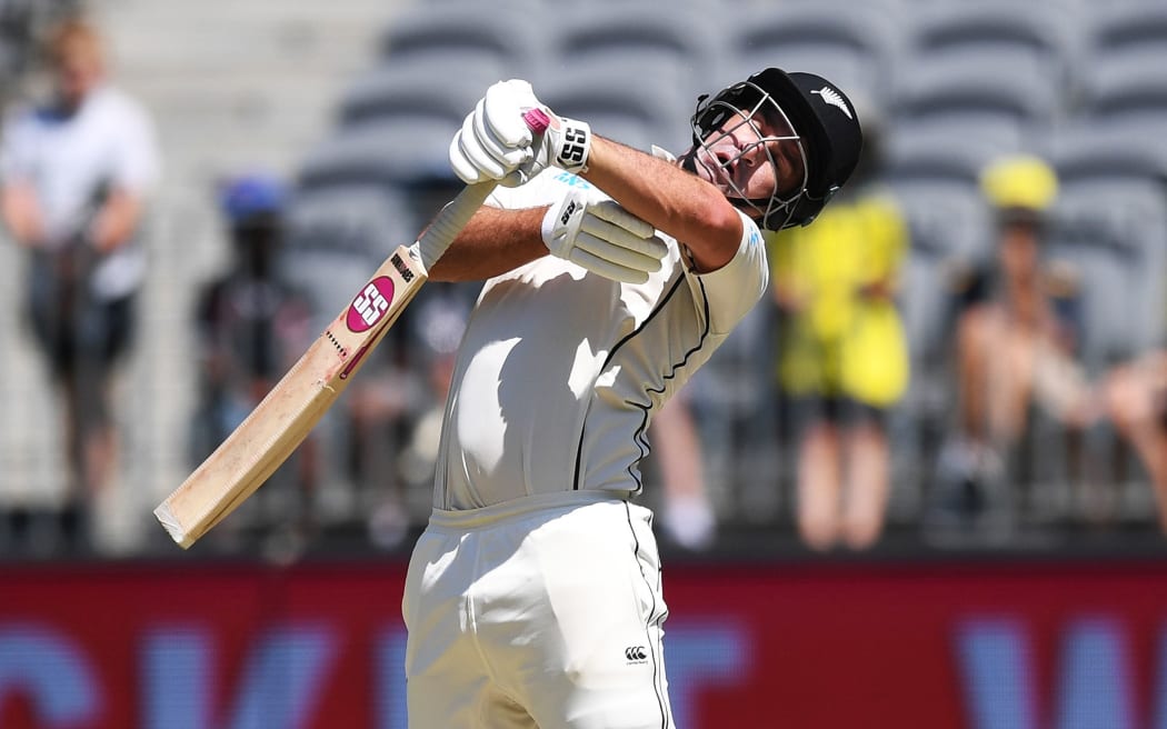 Black Caps all-rounder Colin de Grandhomme cops a short ball from Australian fast bowler Mitchell Starc.