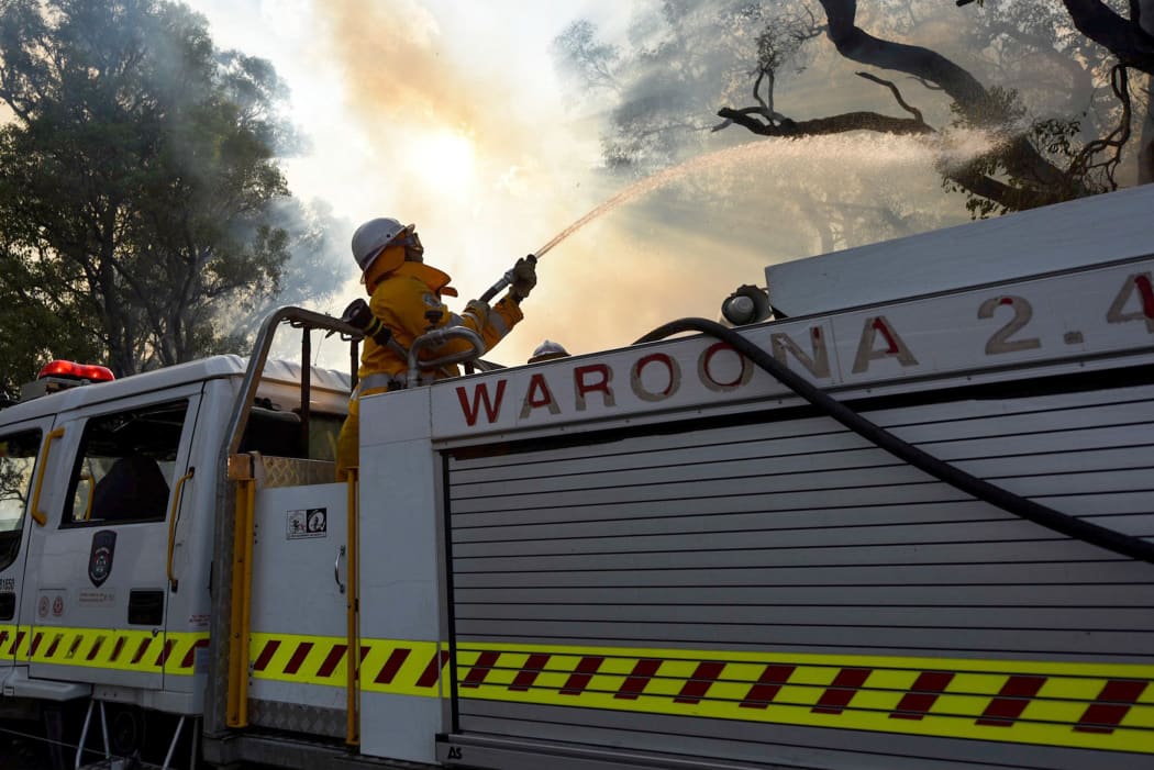 Firefighters battling a fire near Waroona in Western Australia.