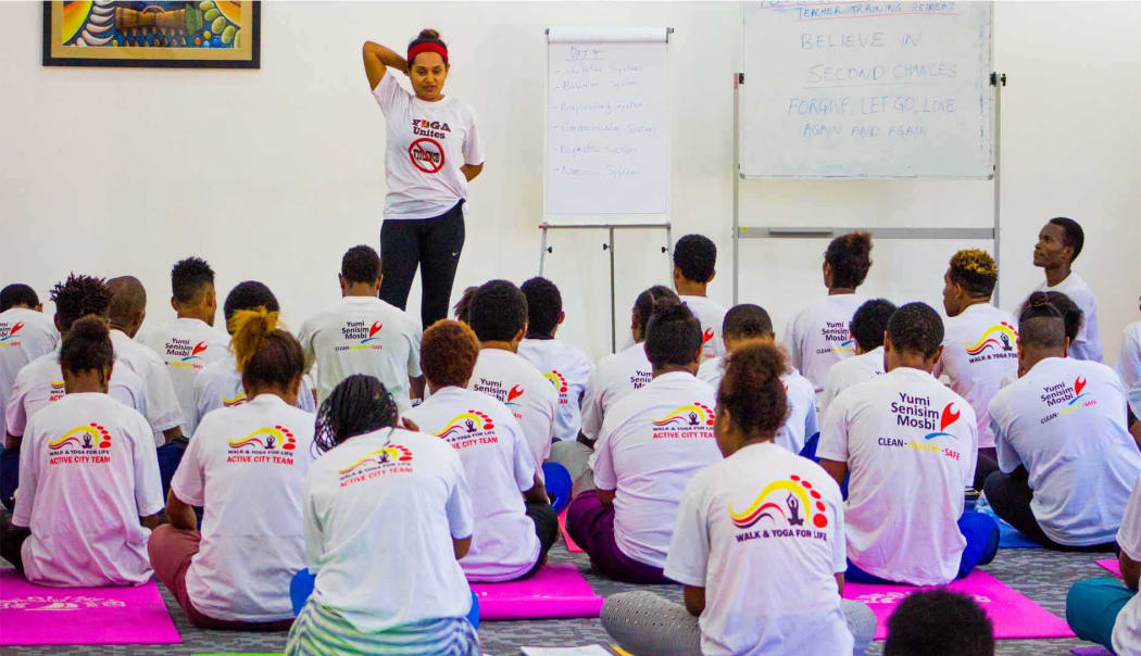 Fazilah Bazari, manager of the yoga component in the PNG National Capital District's Active City Development programme, teaching students.