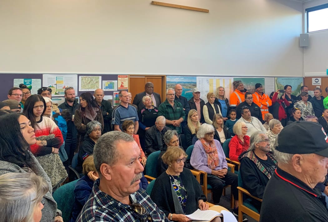 The council’s decision on the land drew one of the biggest crowds ever to a council meeting. Councillor Louis Rapihana can be seen standing in the doorway at the back of the room.