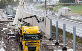 The 4-metre high 'Great Wall of Calais' being built as the French authorities prepare to dismantle a camp for refugees and migrants trying to reach the UK.