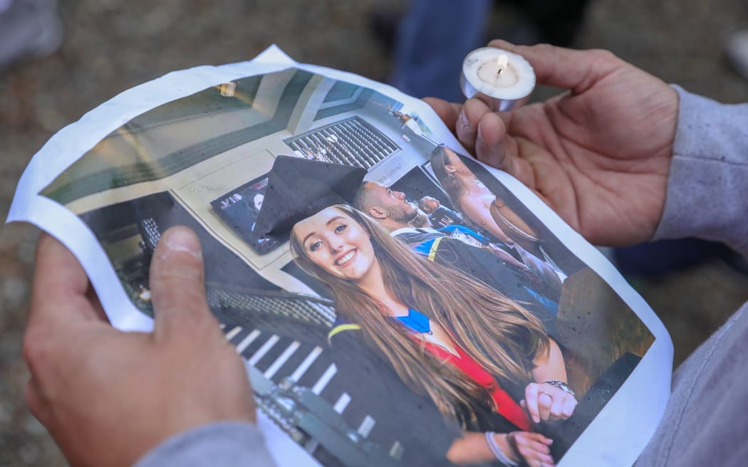 Backpackers gather in Queenstown for a vigil for Grace Millane