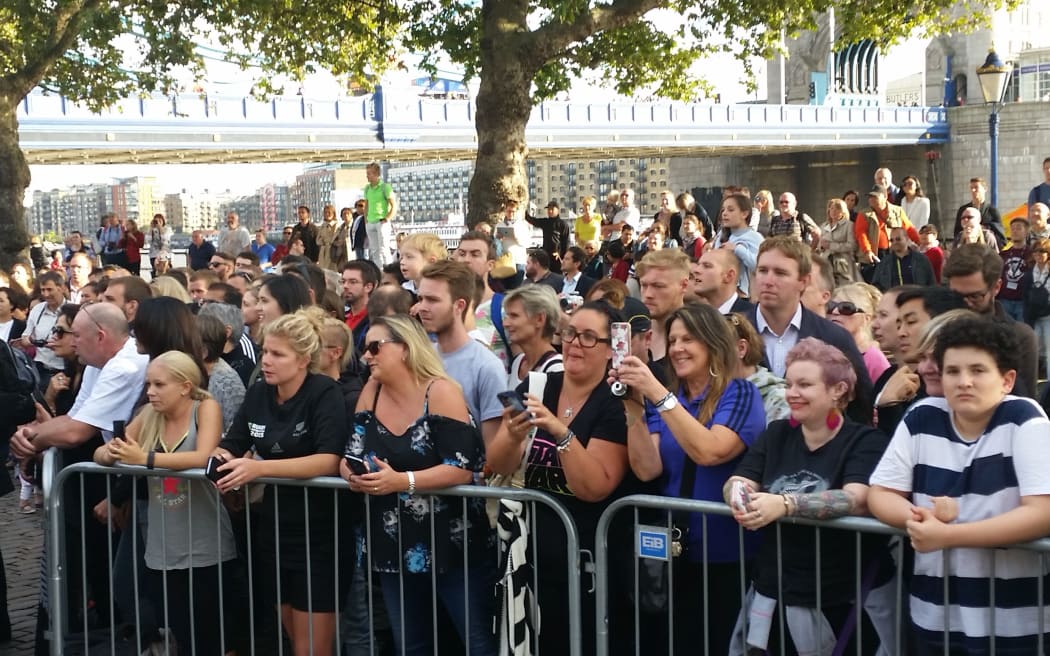 Fans await the All Blacks' arrival in London.