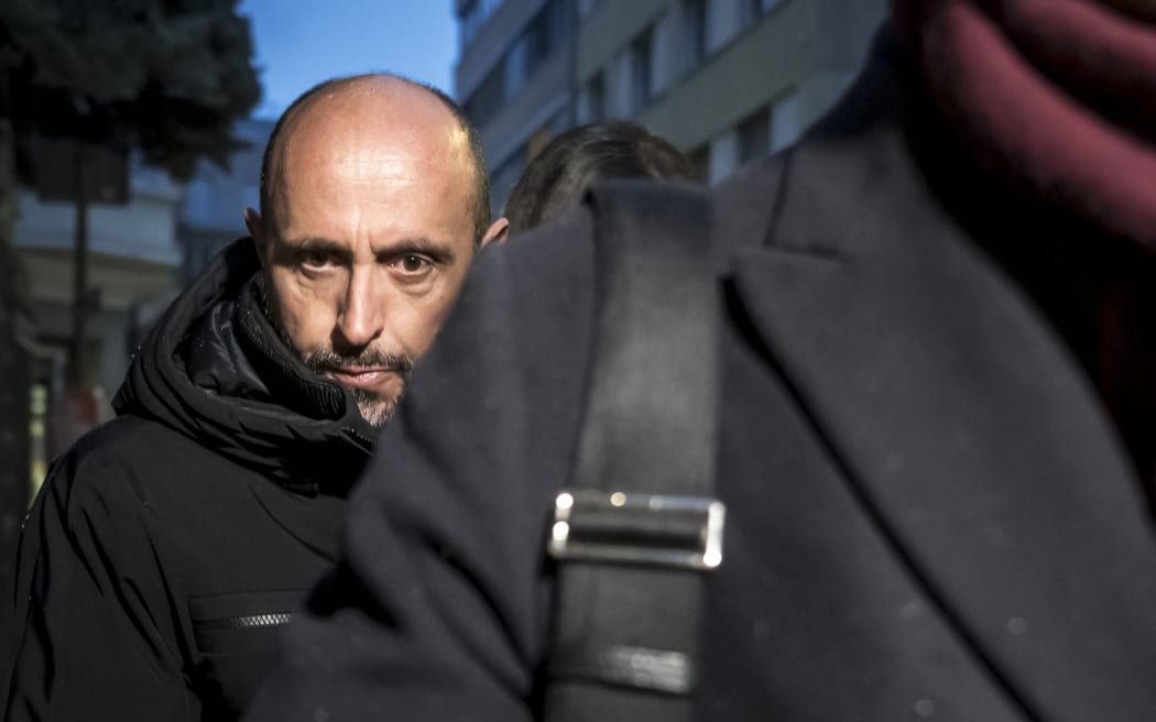 (FILES) French co-owner of Le Constellation bar Jacques Moretti arrives for a hearing at the Office of the public prosecutor of the Canton of Valais, in Sion, on January 9, 2026. The co-owner of the Swiss bar hit by a deadly fire during New Year celebrations was allowed to walk free from custody on January 23, 2026, after bail was paid on his behalf. Jacques Moretti, 49, and his 39-year-old wife Jessica, who are both French, co-own Le Constellation, a bar in the ski resort of Crans-Montana in southern Switzerland. (Photo by Fabrice COFFRINI / AFP)
