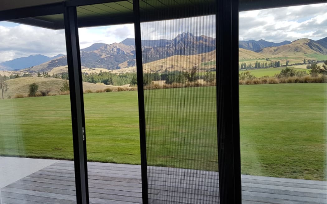 A retractable fly screen door.