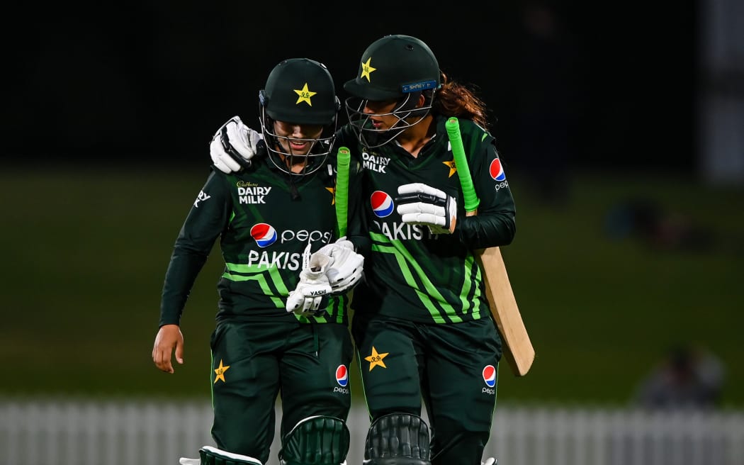 Fatima Sana of Pakistan and Aliya Riaz of Pakistan in New Zealand in 2023.
