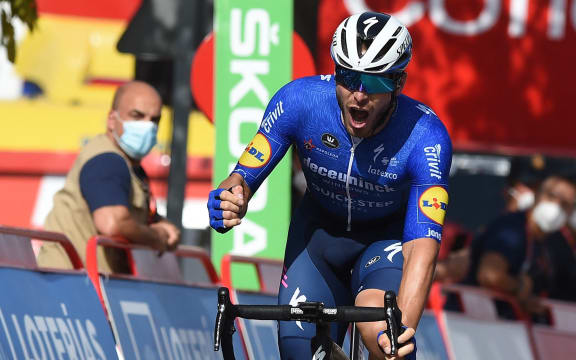 Team Deceuninck's French rider Florian Senechal celebrates as he wins the 13th stage of the 2021 La Vuelta cycling tour of Spain, a 203.7 km race from Belmez to Villanueva de la Serena, on August 27, 2021.