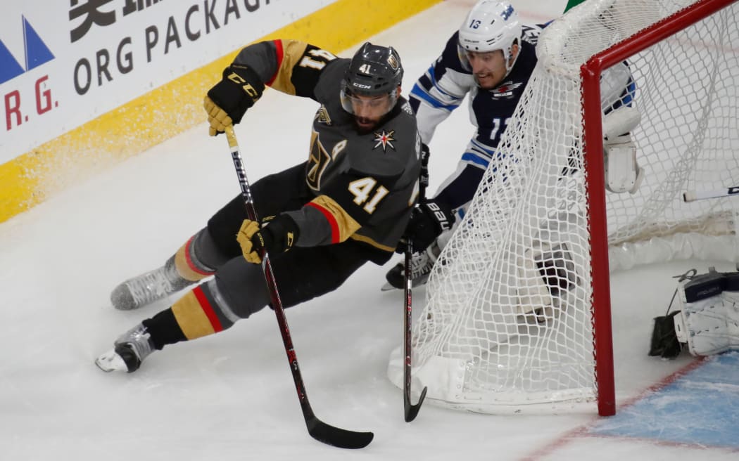 Vegas Golden Knights left wing Pierre-Edouard Bellemare (41) looks to take a shot around the post during the Western Conference play off series.