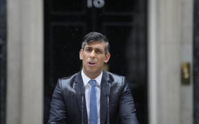 Britain's Prime Minister Rishi Sunak speaks to the media outside 10 Downing Street in London Wednesday, May 22, 2024, as he announces that he is to call a General Election for July 4. (AP Photo/Kin Cheung)