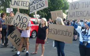 Linda Way, centre, said she could lose her home if the plant was built in Oratia.