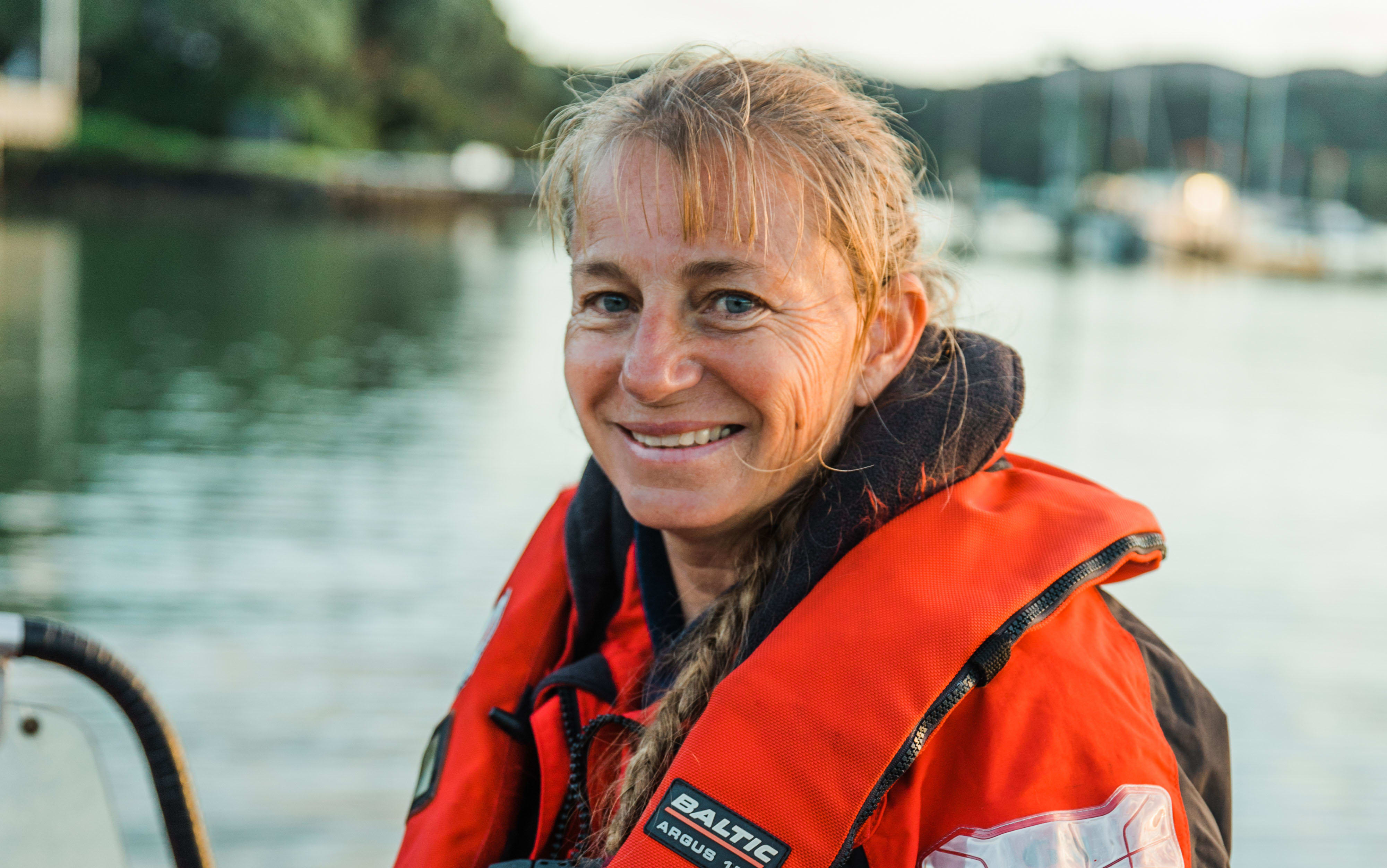 Dr Ingrid Visser aboard her boat in Mill Bay, Mangonui Harbour, Northland