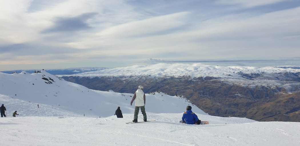 Skiers and snowboarders at Cardrona Alpine Resort