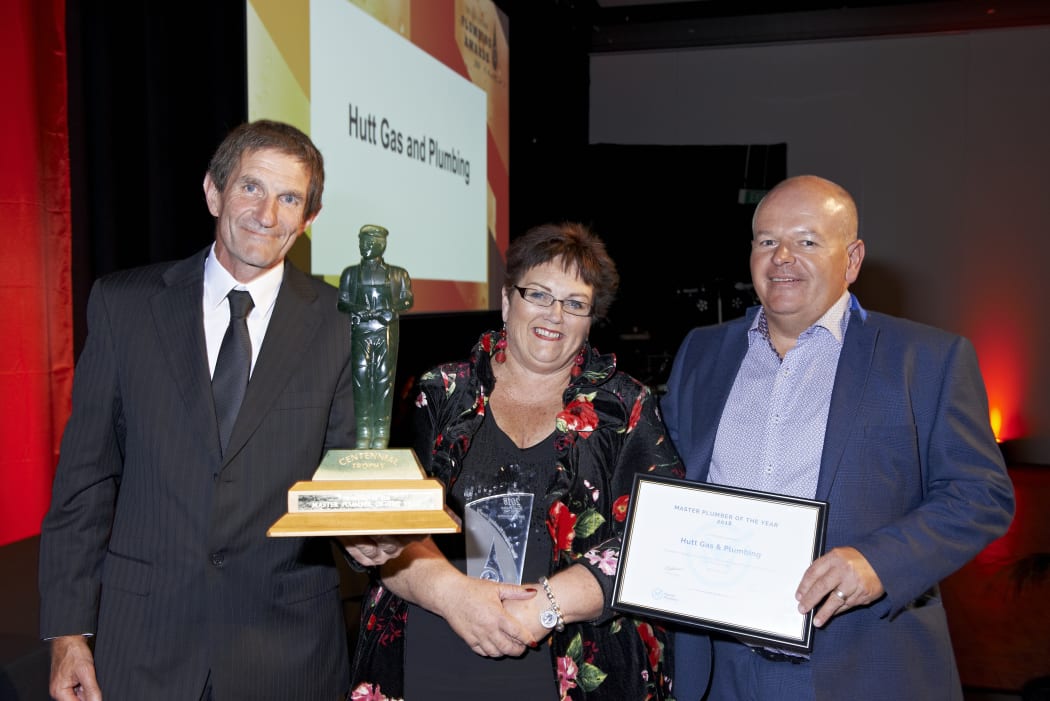 Colleen Upton with her colleagues after winning NZ Master Plumber of the Year