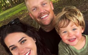 Aucklander Sam Clayton, pictured with his wife and son. Sam was scammed of $41,000 through his bank, BNZ. More than $18,000 remains outstanding.