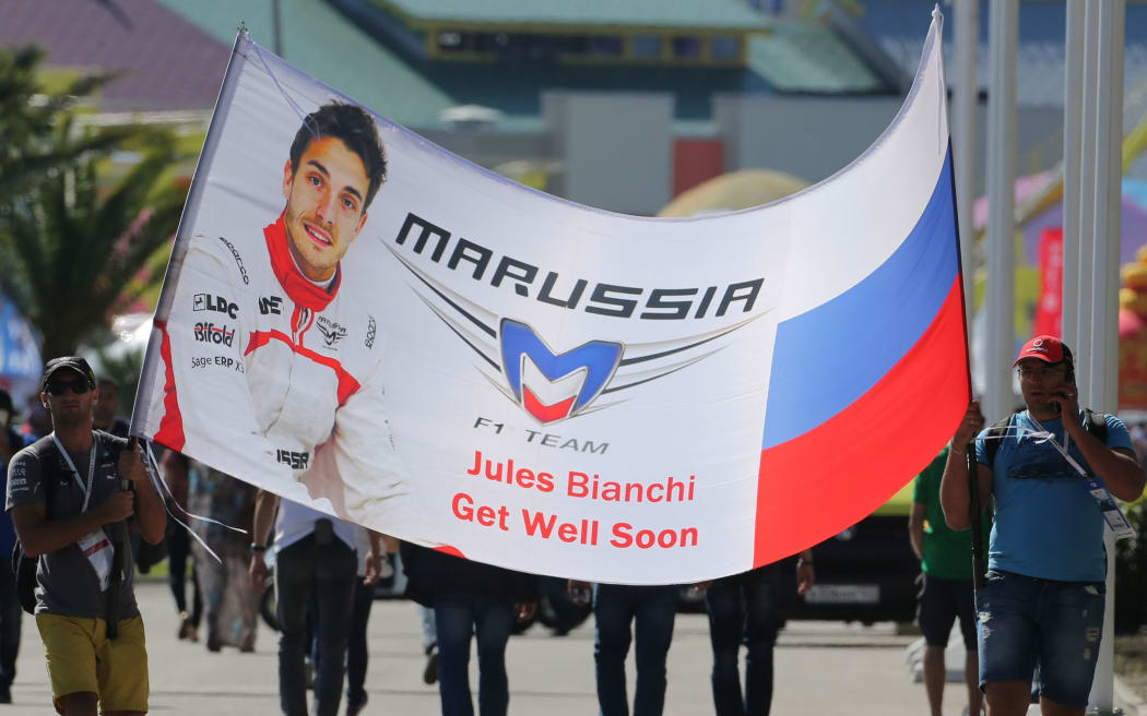 Fans display a banner at Sochi
