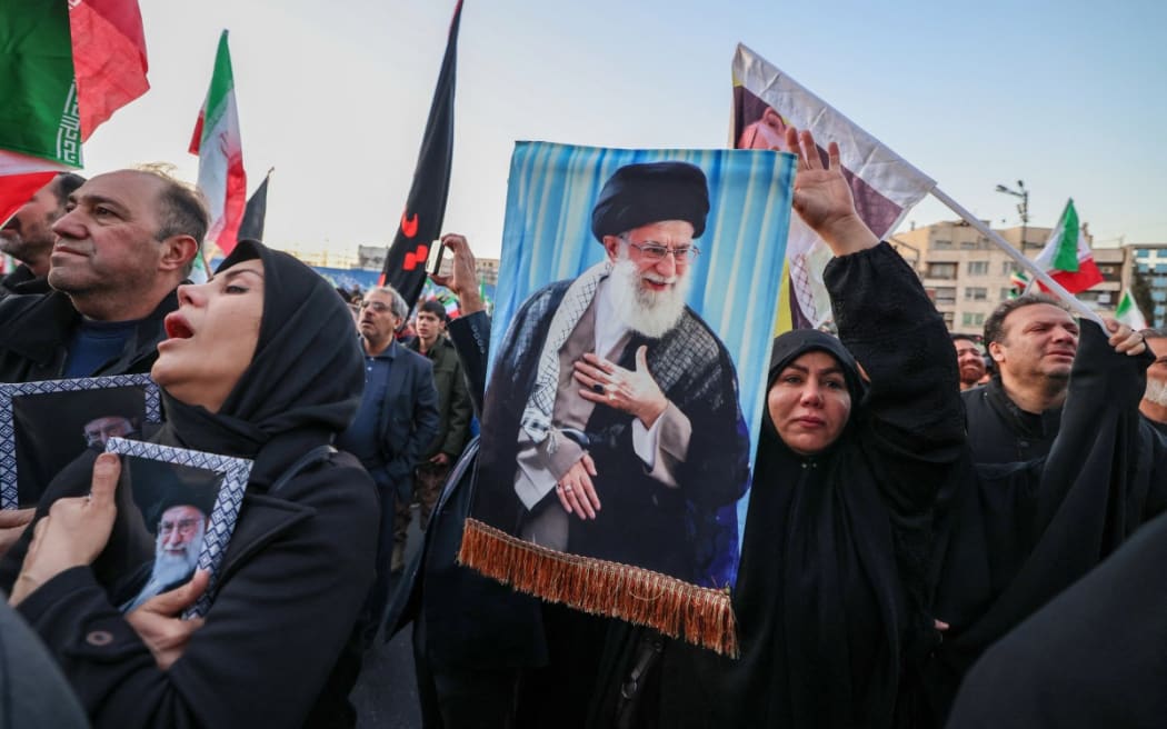 People mourn the death of Iran’s Supreme Leader Ayatollah Ali Khamenei, who was killed in joint US and Israeli strikes, at a square in Tehran on 1 March 1, 2026.