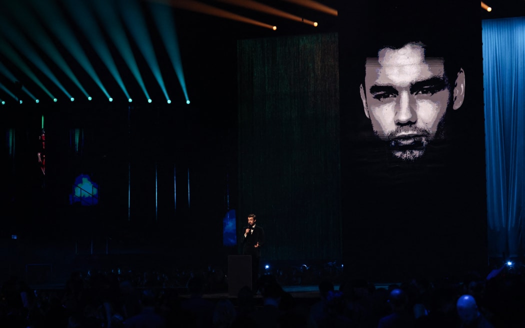 British comedian and host Jack Whitehall speaks during a tribute for late British singer Liam Payne during the BRIT Awards 2025 in London on March 1, 2025. (Photo by Adrian Dennis / AFP) / RESTRICTED TO EDITORIAL USE – NO POSTERS – NO MERCHANDISE– NO USE IN PUBLICATIONS DEVOTED TO ARTISTS