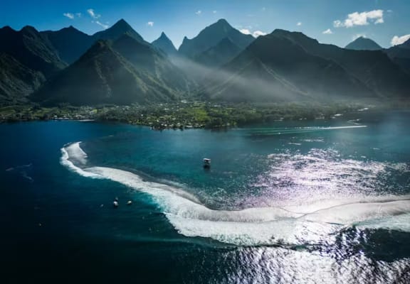 Olympic views: the surf break at Teahupo'o with Tahiti Iti in the background.