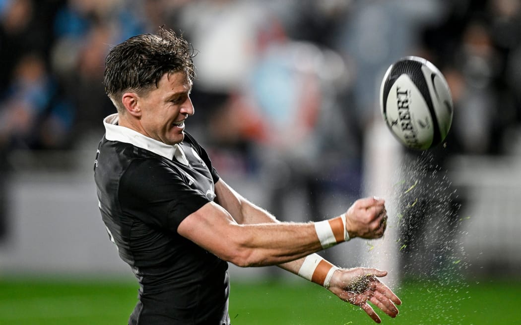 Beauden Barrett of New Zealand celebrates his try.