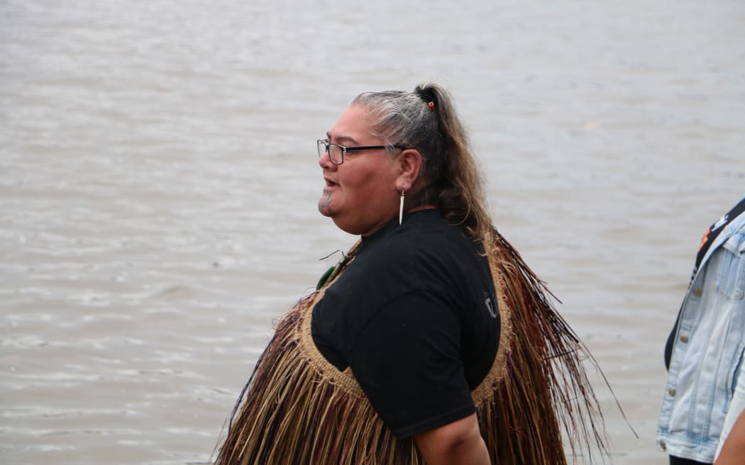 The waka flotilla makes it way to Te Tii beach on Waitangi Day.