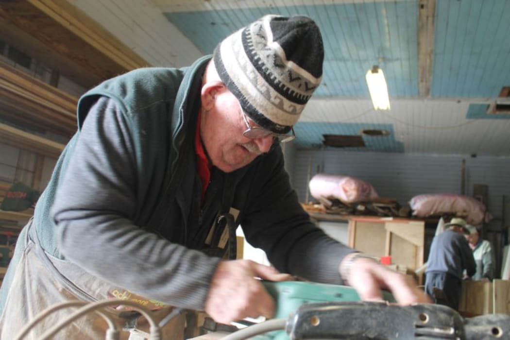 This an image of Whangarei Men's Shed member Peter Twist hard at work..