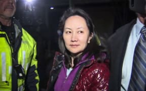 Huawei Technologies Chief Financial Officer Meng Wanzhou exits the court registry following a bail hearing at British Columbia Superior Courts in Vancouver on December 11, 2018.