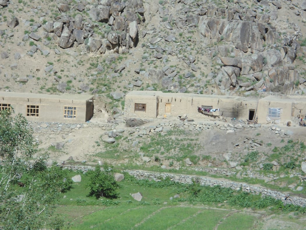 The book's authors said this photo showed Fatima's house, centre, which was seriously damaged at the time of the raid but had since been rebuilt.