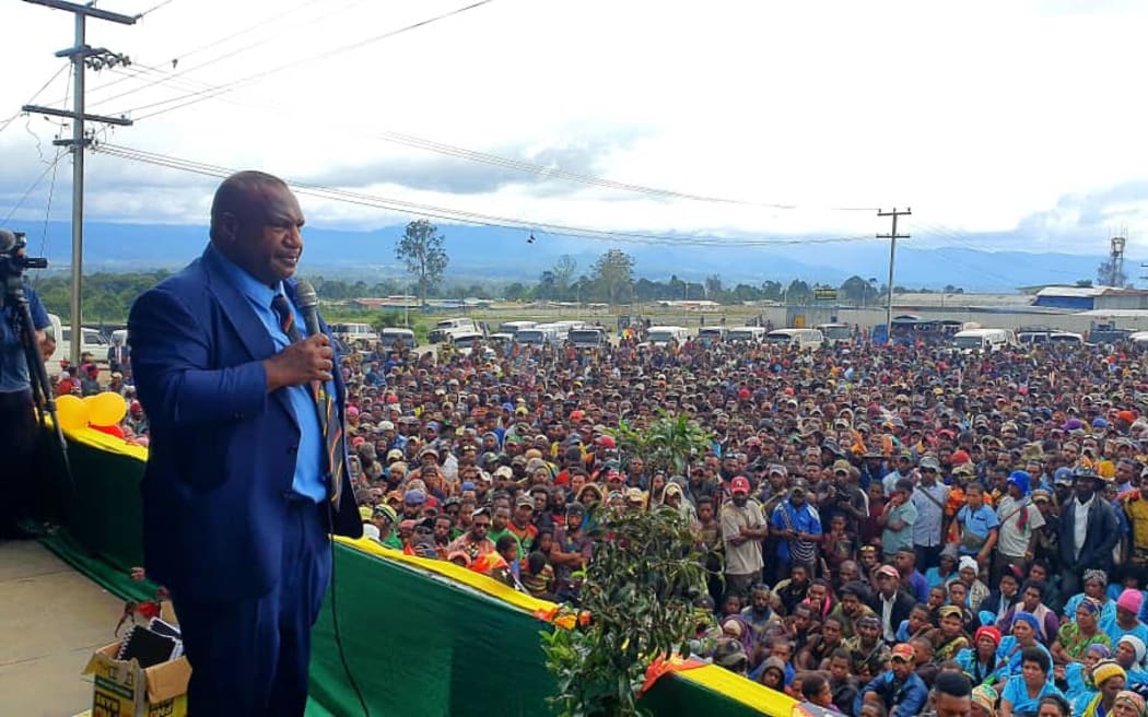 PNG Prime Minister James Marape addresses a large crowd in Tari at an event to mark the surrendering of high-powered weapons by groups under four separate warlords. 8 August, 2021
