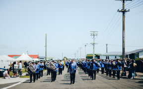 A band leads the procession of followers into Rātana temple as morehu celebrate the birthday of the faith's founder on 25 January, 2021.