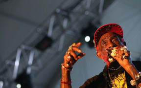 Musician Lee "Scratch" Perry performs onstage during day 1 of the 2013 Coachella Valley Music & Arts Festival at the Empire Polo Club on April 12, 2013 in Indio, California.