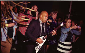 Manuel Springford performing with his band WavePig, who perform some songs in Te Reo