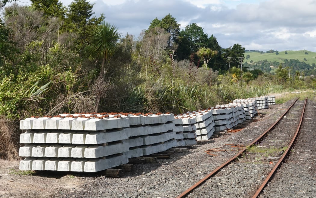 Railway sleepers are stacked by the thousands across the Far North for an upgrade that's now on hold.