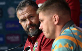 British and Irish Lions' head coach Andy Farrell (L) and player Owen Farrell.