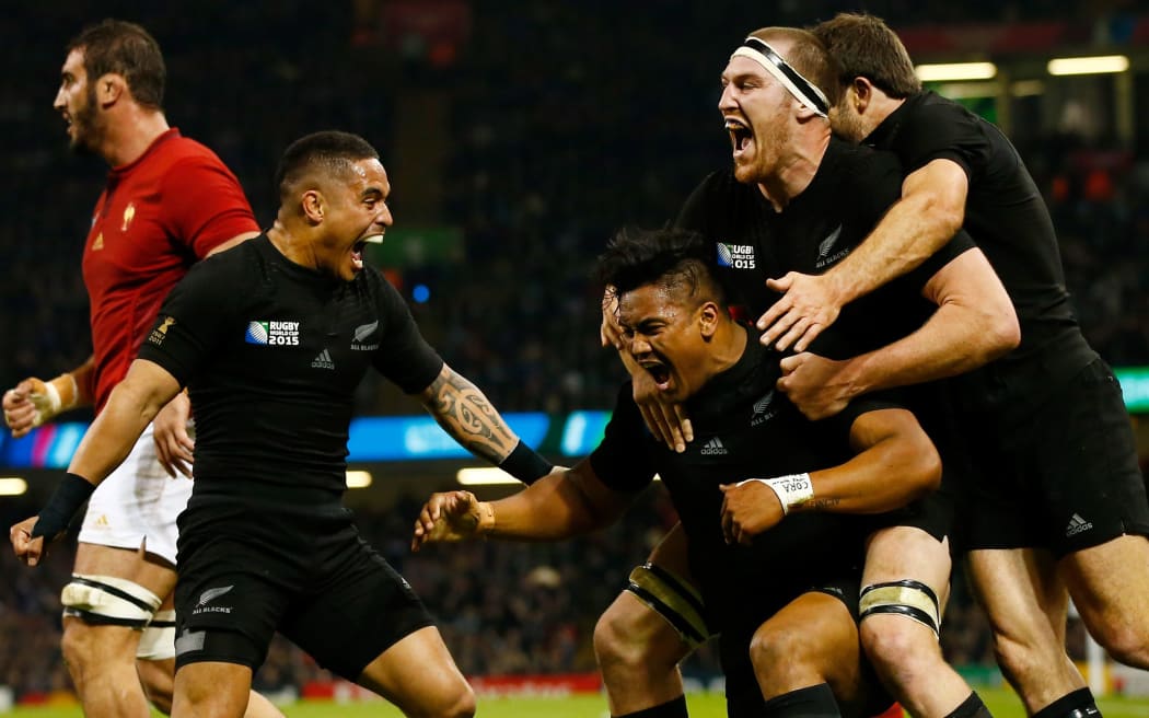 The All Blacks celebrate the second of Julian Savea's three tries against France, RWC, 2015.