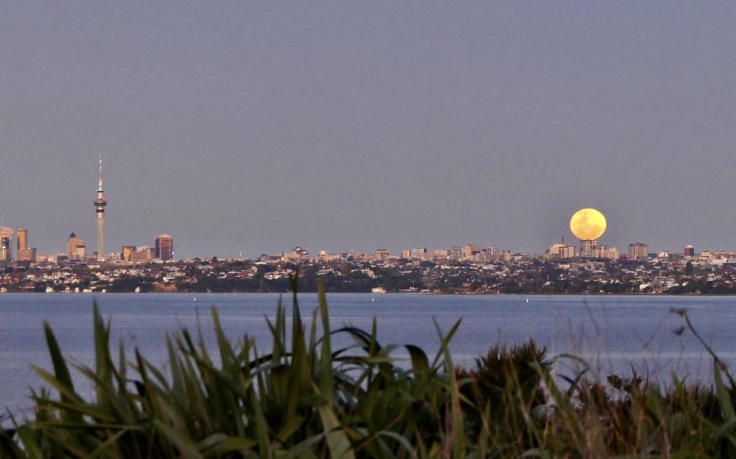 The super blue moon, as seen from Auckland's Te Atatu, above Harbourview Beach.