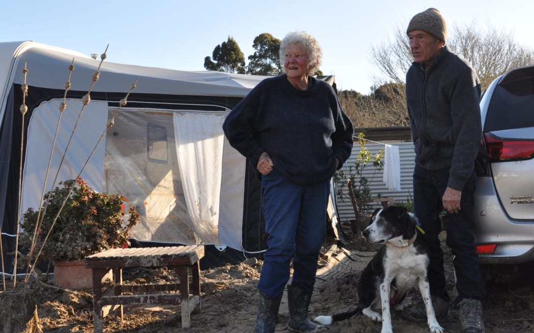 Marguerite Besier and Roger Croft had to be rescued from their caravan by a frontend loader, as floodwaters rose last Friday.
