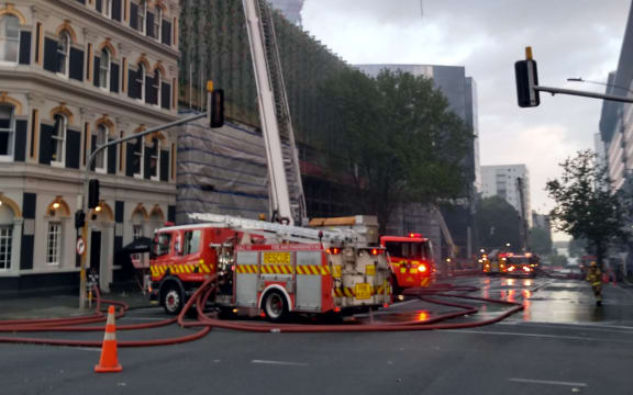 A crane working at the side of the convention centre building