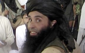This frame grab taken in 2013 from 2008 video footage shows Mullah Fazlullah.