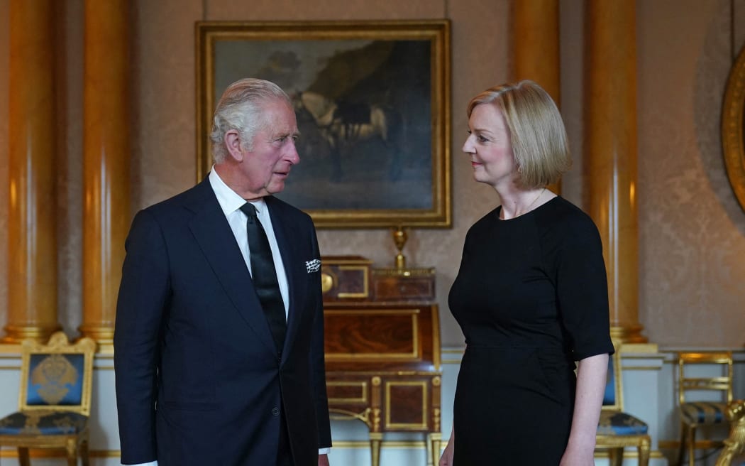 King Charles III speaks with Britain's Prime Minister Liz Truss during their first meeting at Buckingham Palace in London on September 10, 2022.