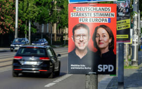 An election poster showing Germany's Social Democratic Party SPD's lead candidate Matthias Ecke (left) for the upcoming European Parliament elections, attached to a lamp post in Dresden, Germany on 4 May, 2024.