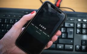 ANoM logo on phone