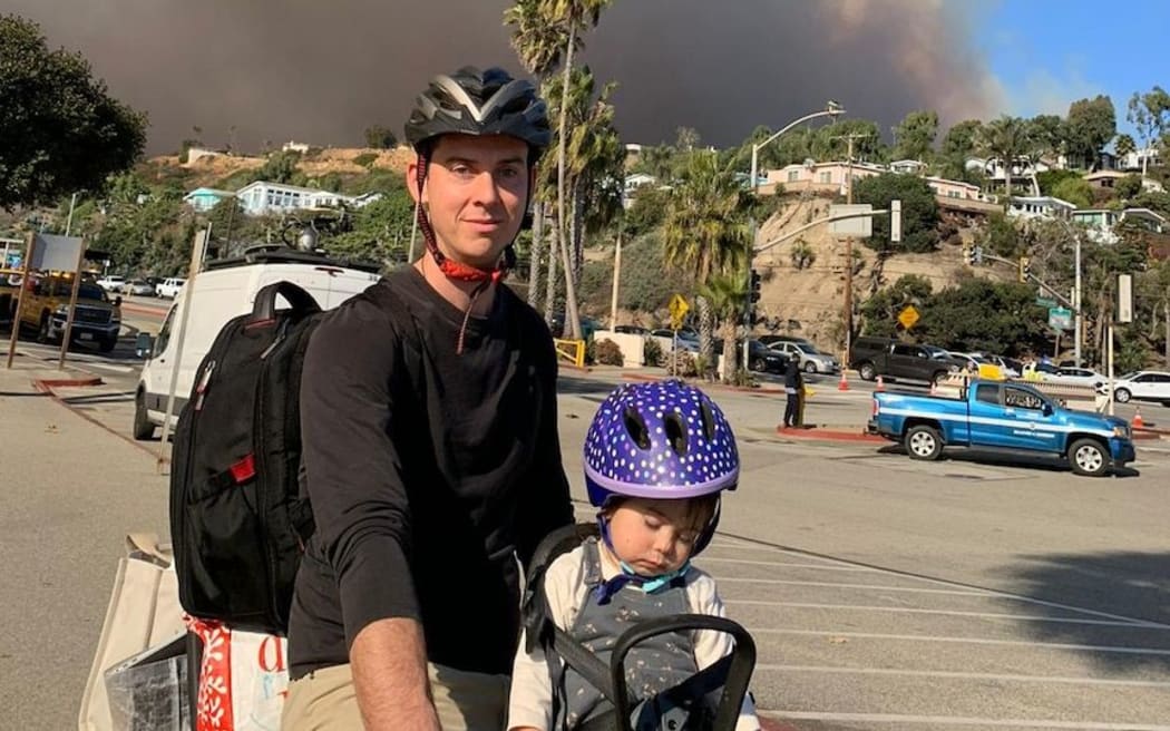 Joel House and his daughter leave their LA home on a pushbike.