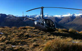 A Robinson R44 of the kind Stephen Combe and James Patterson-Gardner died in near Lochy River last year.