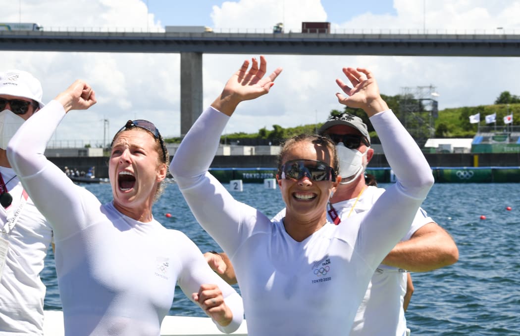 Winners New Zealand's Lisa Carrington (R) and New Zealand's Caitlin Regal celebrates after in the women's kayak double 500m final during the Tokyo 2020 Olympic Games at Sea Forest Waterway in Tokyo on August 3, 2021.